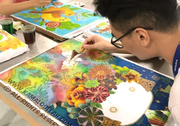 A Malaysian artisan working on a traditional craft