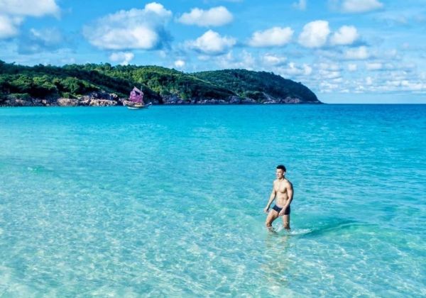 A traveller resting on a tropical Malaysian beach
