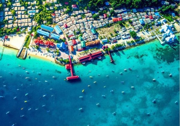 A colourful island village beside the sea