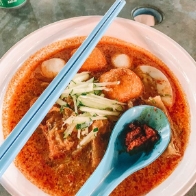 A bowl of creamy Nyonya laksa